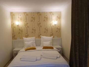 Фото номера Семейный суперлюкс с балконом Отель Grand Hotel Minerva Resort &amp; SPA г. Бэиле-Еркулане 4