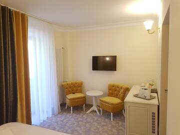 Фото номера Семейный суперлюкс с балконом Отель Grand Hotel Minerva Resort &amp; SPA г. Бэиле-Еркулане 3