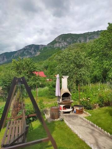 Фото номера Стандартный двухместный номер с 1 кроватью Гостевой дом Cazare Casa Sandra г. Бэиле-Еркулане 7