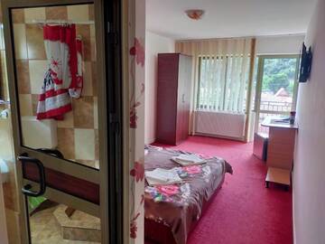 Фото номера Стандартный двухместный номер с 1 кроватью Гостевой дом Cazare Casa Sandra г. Бэиле-Еркулане 10